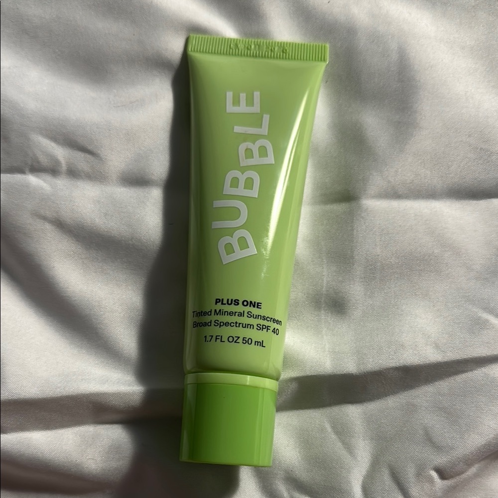 Green Foundation with Modern Design and Minimalist Packaging